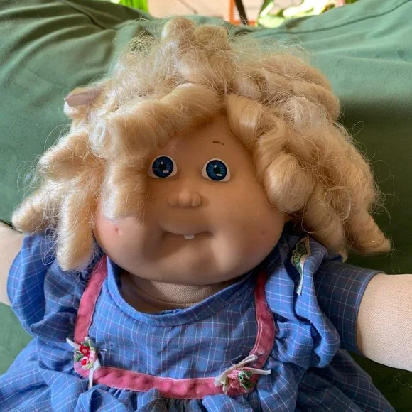 Vintage 1986 Cabbage Patch Cornsilk Kids doll with unopened birth certificate